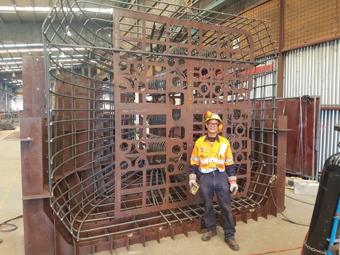 Fabricated steel cage